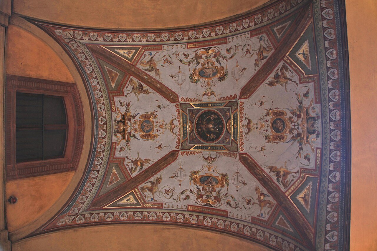 A painted vault under a Bologna portico