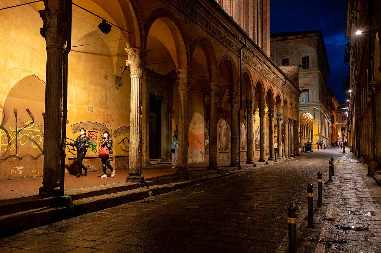 Walking under Bologna's arcades